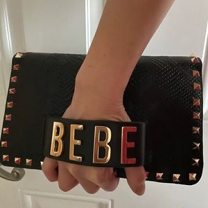 100% leather Bebe crossbody handbag.
